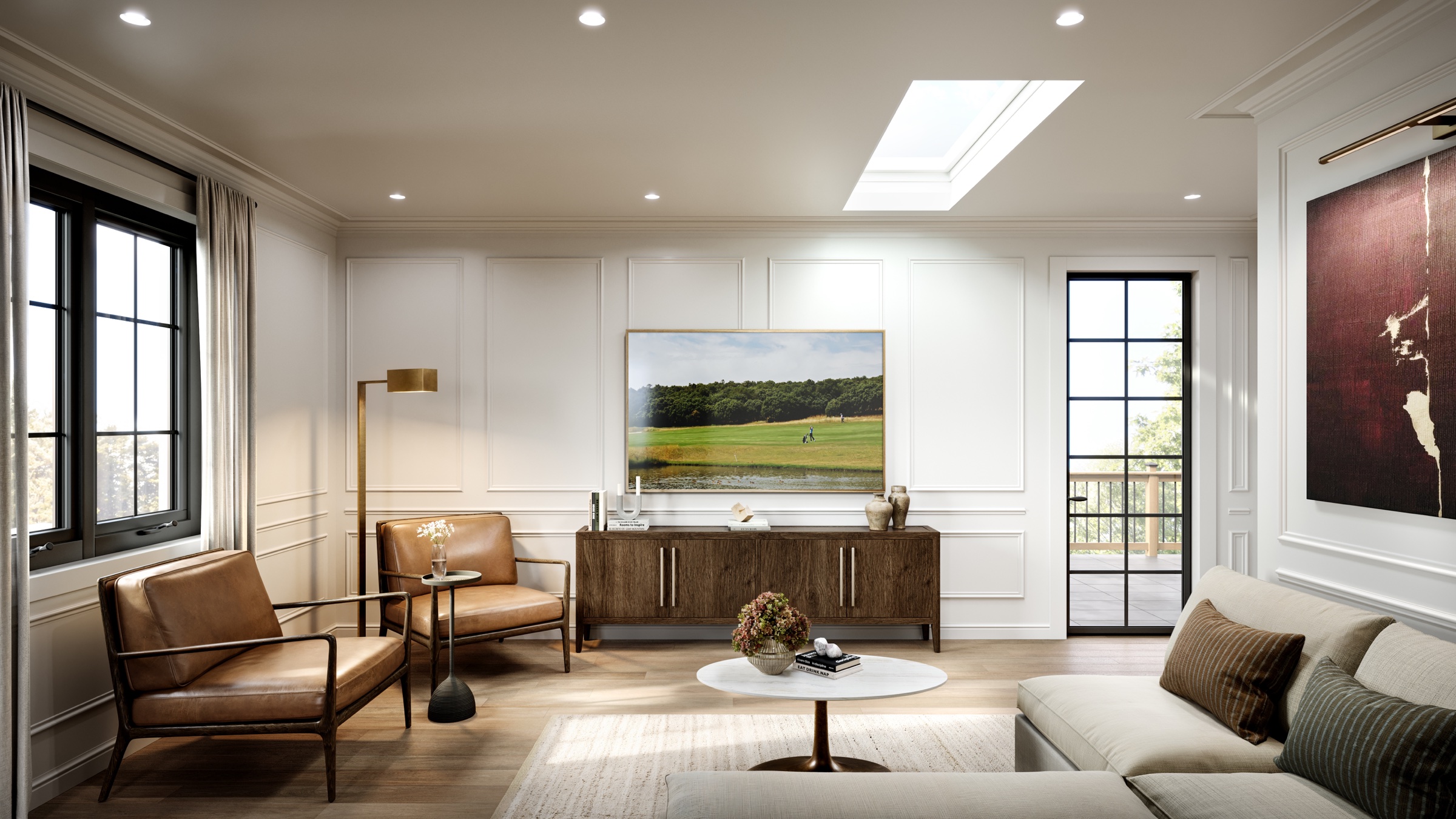 Abacot Hill loft living room with leather armchairs, a sectional sofa, and a skylight